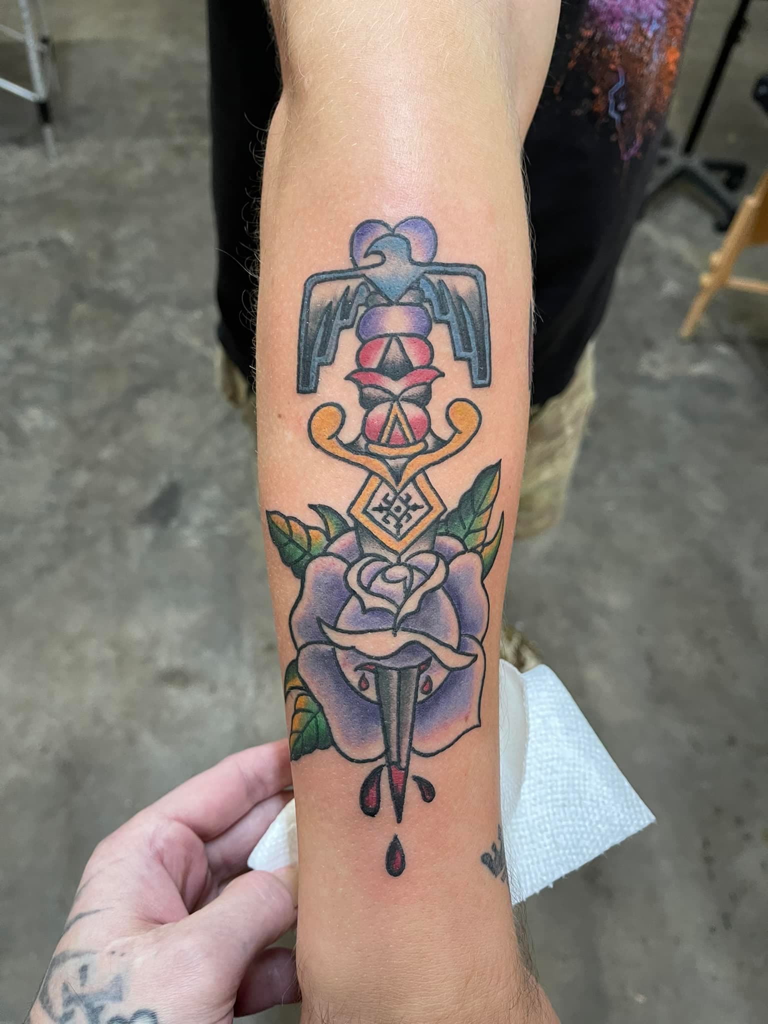 Traditional dagger, thunderbird, and rose — tattoo by @sean_e_bones